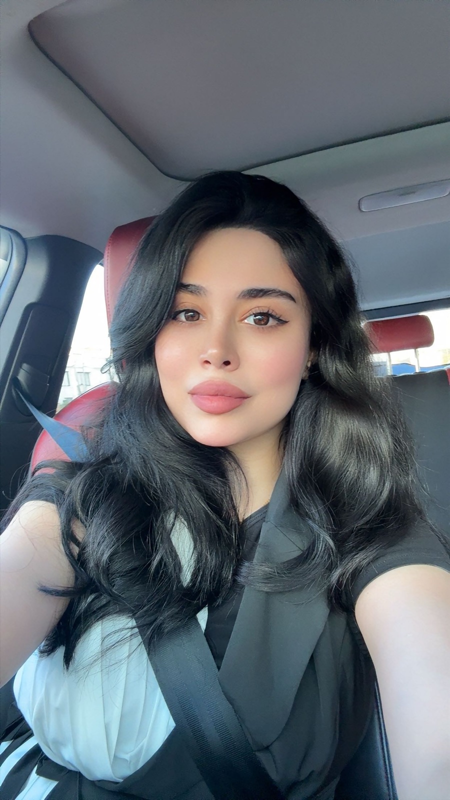 Portrait with long black waves