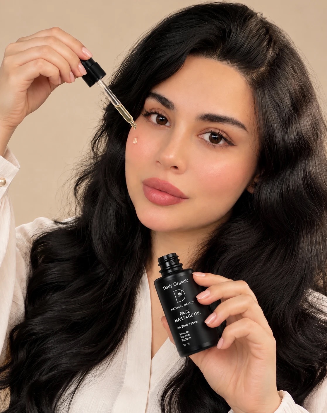 Darya applying Daily Organic Face Massage Oil with a dropper